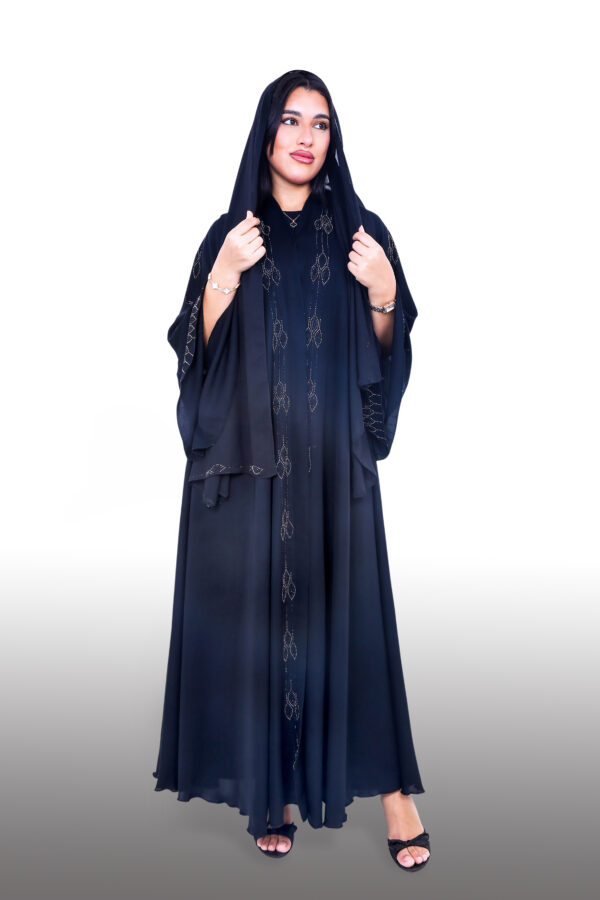 Zwarte abaya met hoofddoek